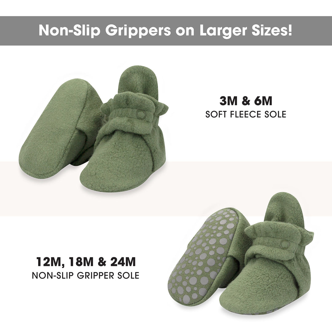 Olive green baby booties with two adjustable snaps on the top.
