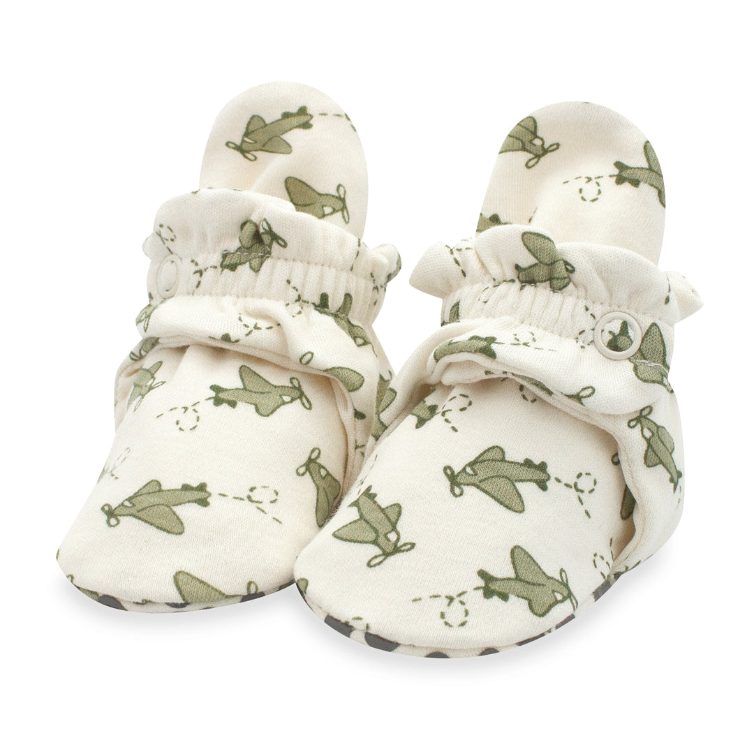 Organic cotton baby booties with gripper soles.