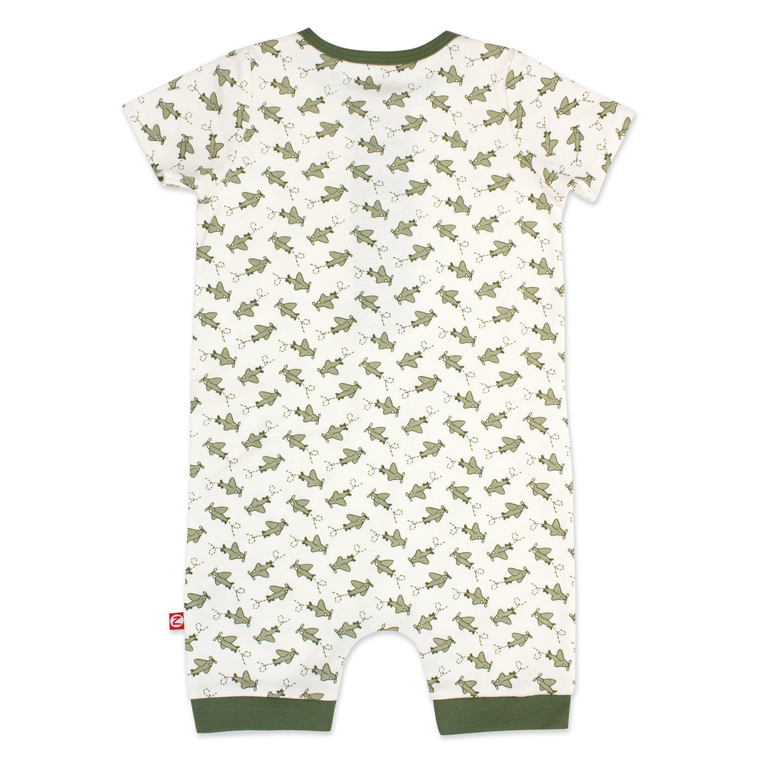Organic cotton henley bodysuit with airplane print in green and beige colors.