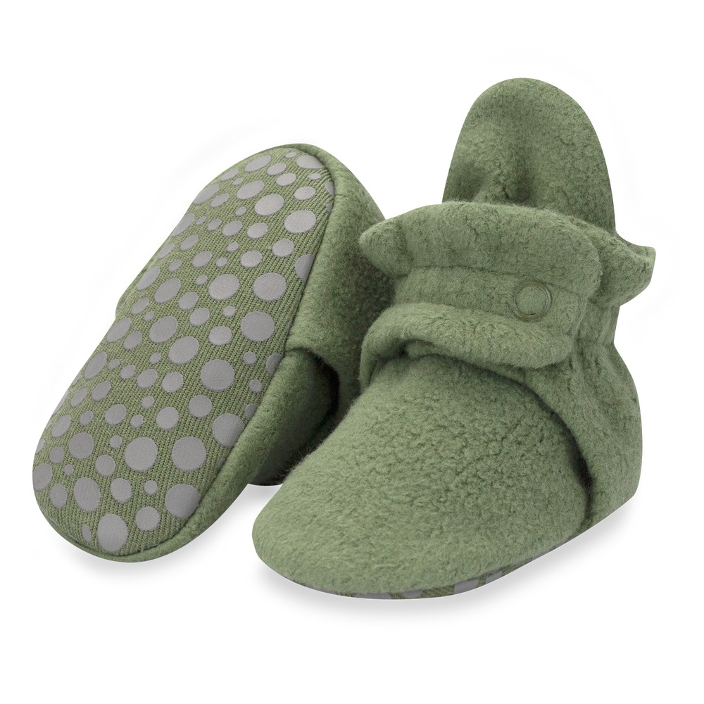 Set of olive green baby booties with two adjustable snaps on the top.