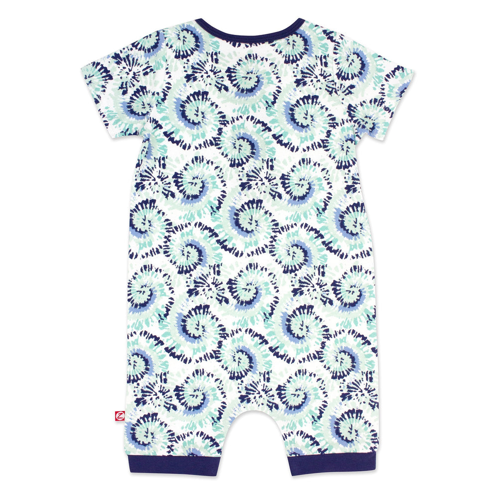 A short-sleeved henley bodysuit with a tie-dye pattern in shades of blue and white.