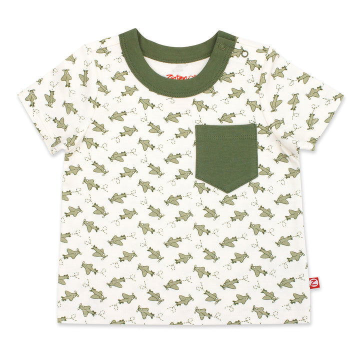 A short sleeve baby tee with a green pocket and airplane print, made from organic cotton, designed for infants.