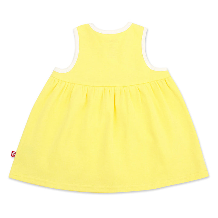 A sleeveless yellow sundress with faux wrap styling, made from organic cotton.