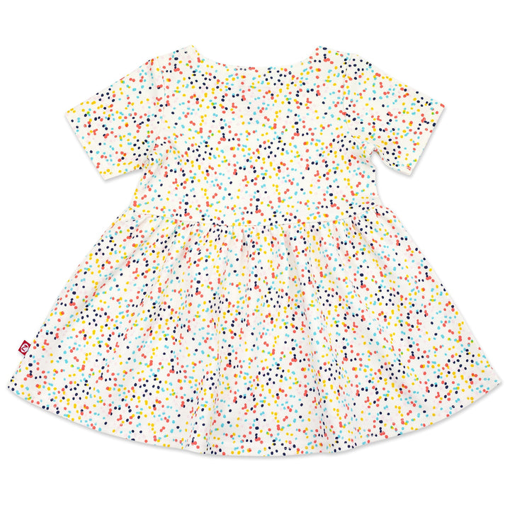 A short sleeve baby dress with a confetti print