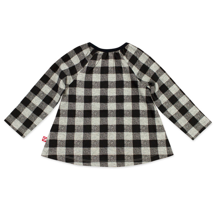 Long sleeve top that has keyhole openings at the top of each shoulder, adding style and making it easy as can be to dress baby girl.