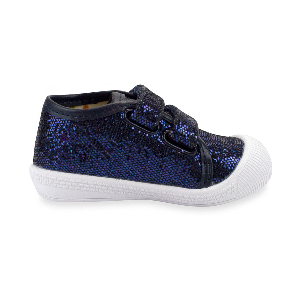 Navy sparkle baby shoes with a hook & loop strap and a flexible rubber outsole.