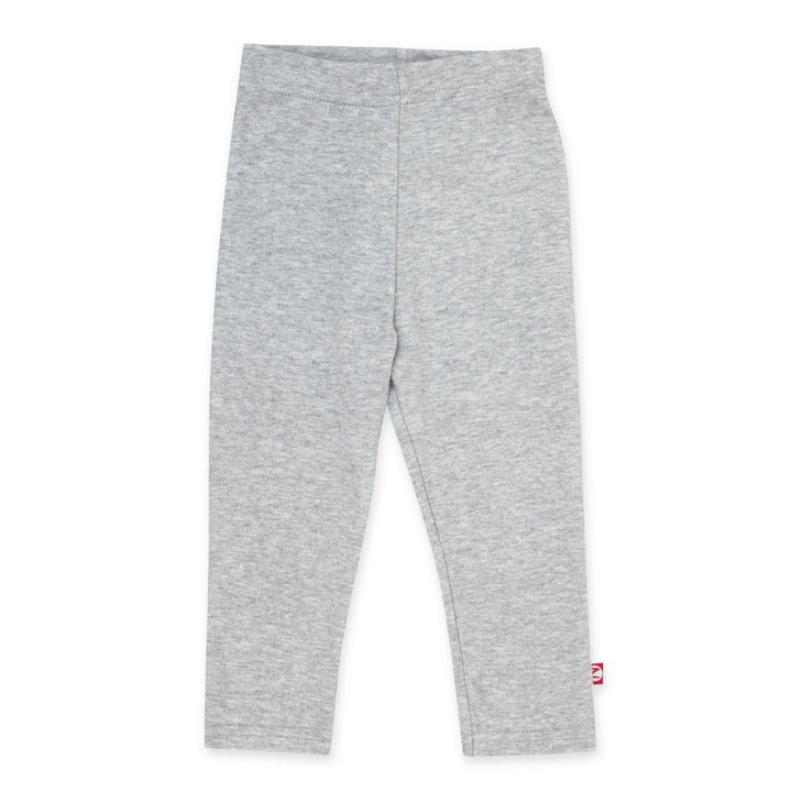 A pair of heather gray organic cotton leggings for kids, with a thick elastic waist band, laid flat on a white background.