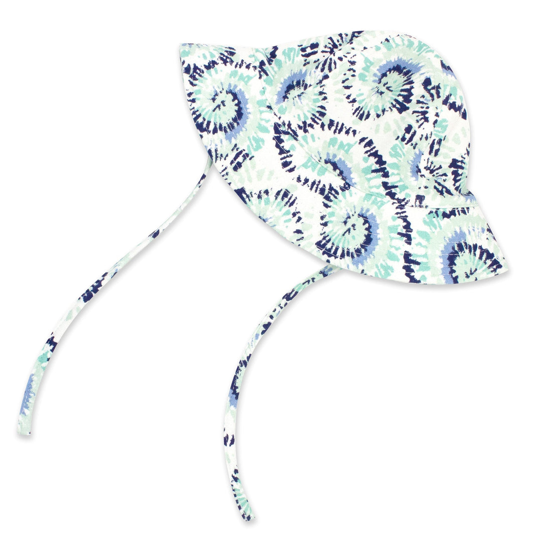 A tie-dye organic cotton sun hat in true navy color with wide brim and chin ties.