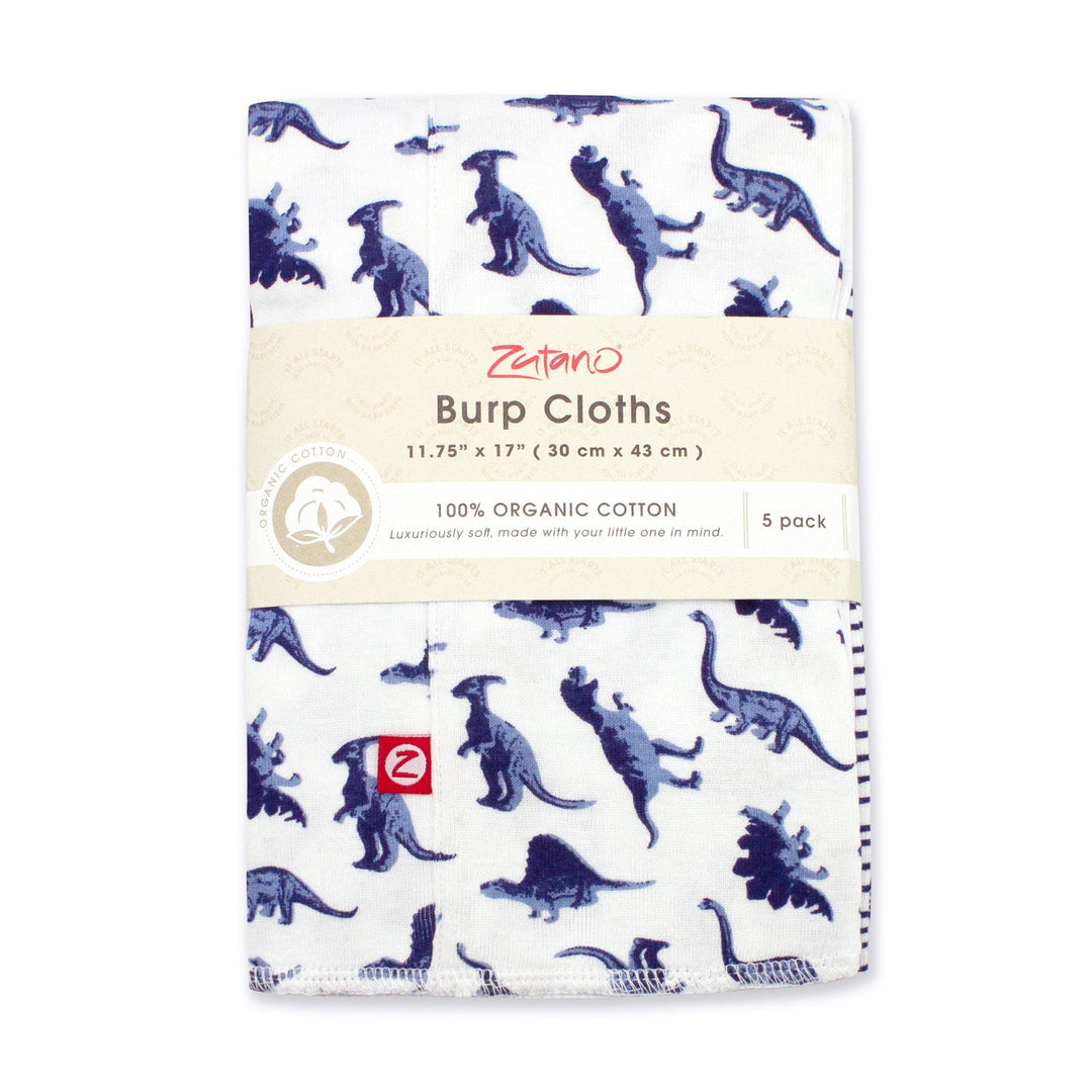 A packaged set of organic cotton burp cloths with a dinosaur print design.