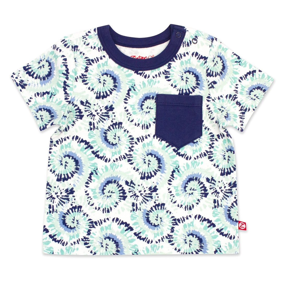 A short sleeve baby tee with a tie-dye print and a contrasting navy blue pocket, made from organic cotton, displayed against a white background.