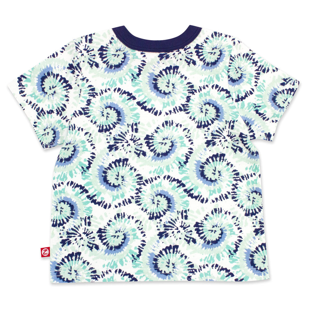 Short sleeve baby tee with a tie-dye print and a contrasting navy blue pocket, made from organic cotton.
