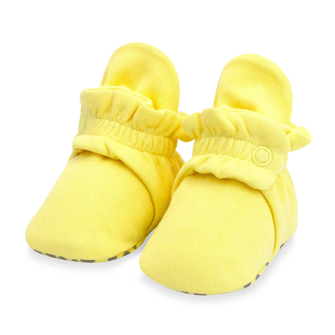 Yellow organic cotton baby booties by Zutano Baby.