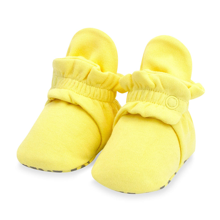 Yellow organic cotton baby booties by Zutano Baby.