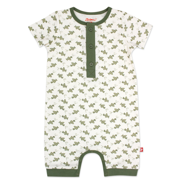 Organic cotton henley bodysuit with airplane print in green and beige colors, featuring a placket with three buttons and a snap between the legs for easy dressing.