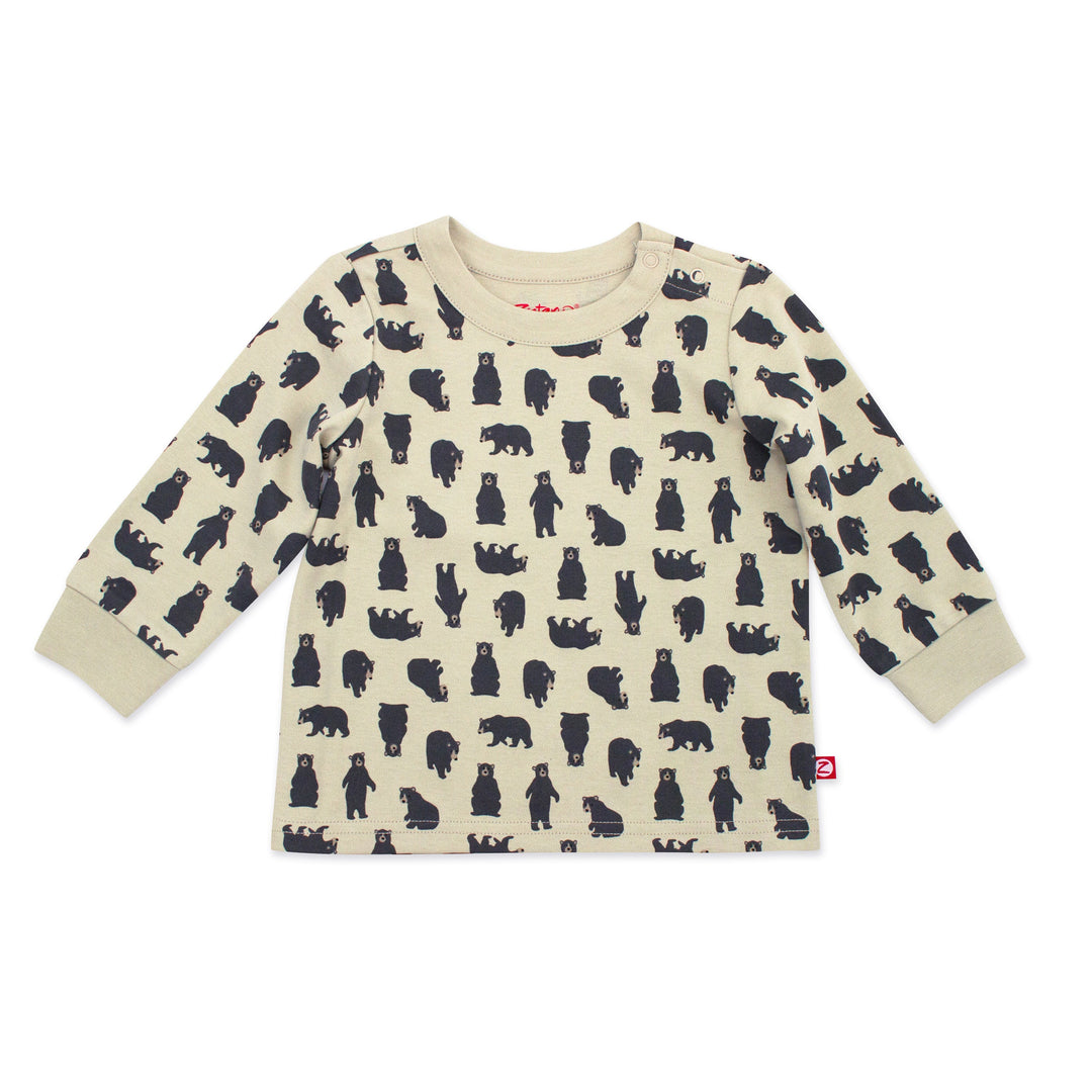 A long sleeve crewneck baby top with a pattern of black bears in various poses on a beige background.