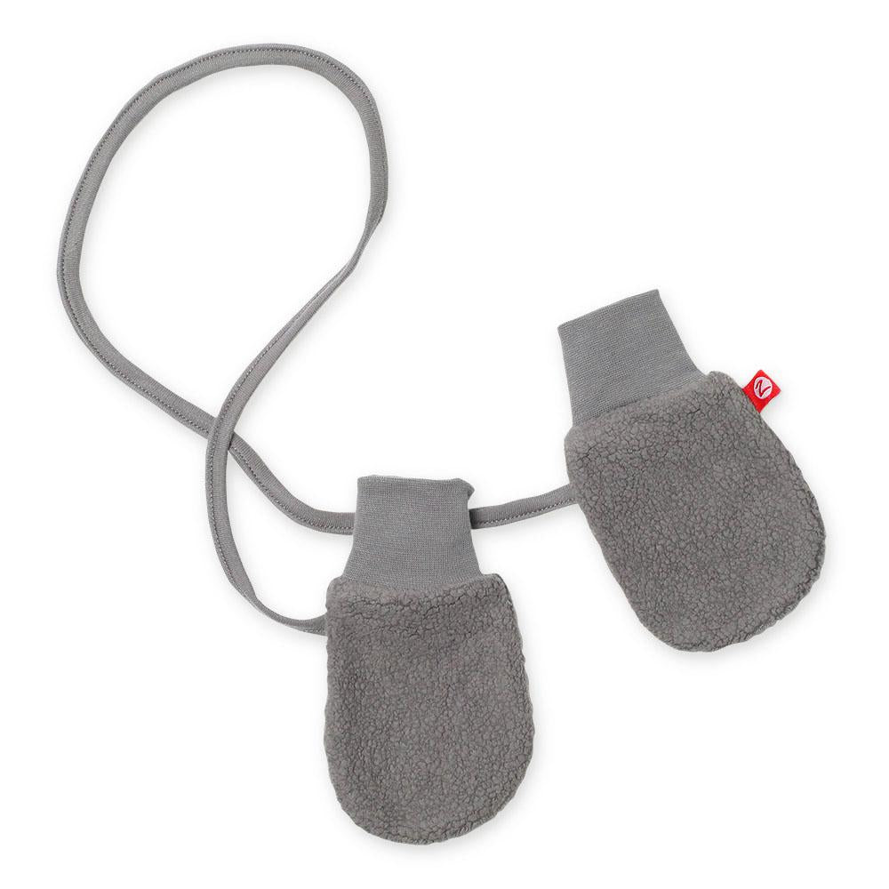 A pair of gray fleece baby mittens with a cuff and string attached for easy attachment to a jacket sleeve.