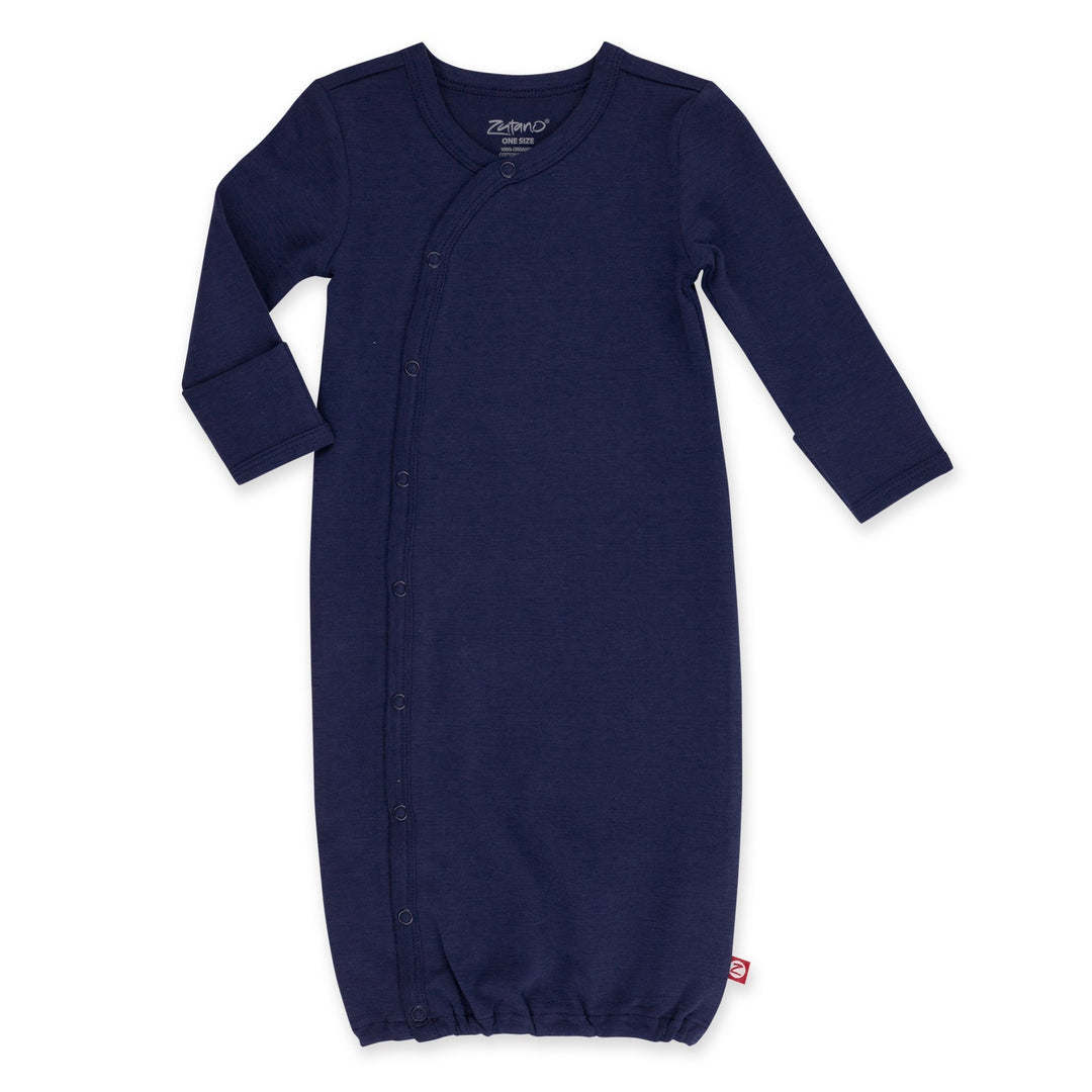 Organic cotton baby kimono gown in navy color, fully snappered at the front for easy changing, with fold-over sleeves and gentle elastic around the bottom.