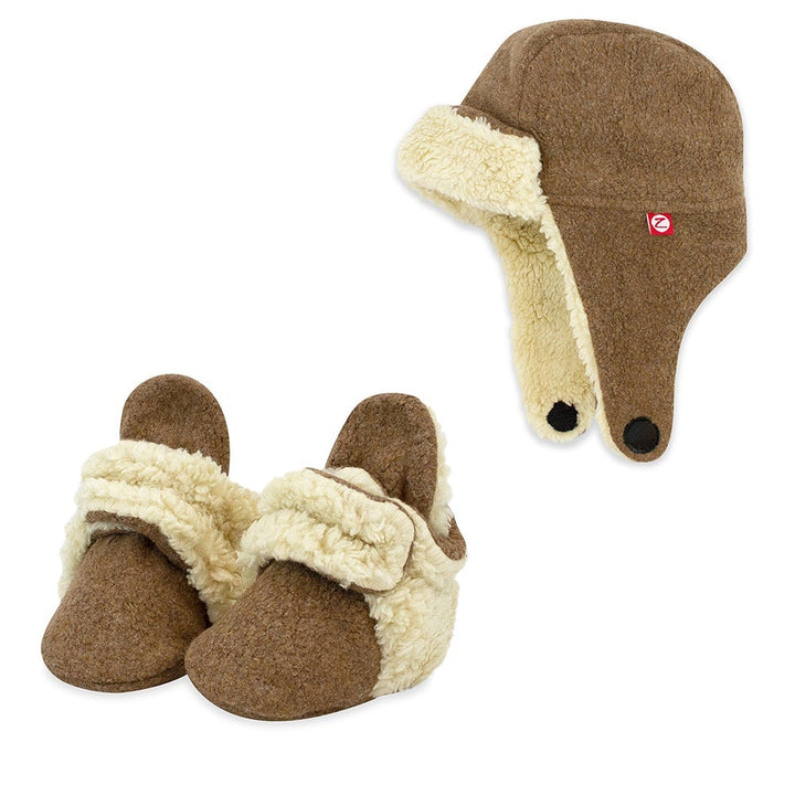 A set of brown Cozie Furry Booties and Trapper Hat for babies, displayed against a white background.