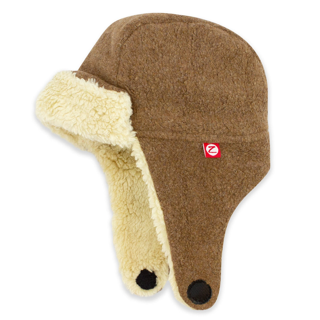 A brown fleece trapper hat with a soft furry lining, designed for children, with straps velcroing under the chin.
