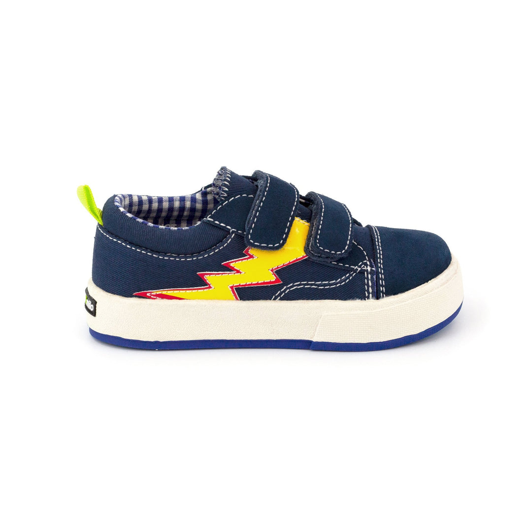 Navy children's sneakers with a flame design on the side.