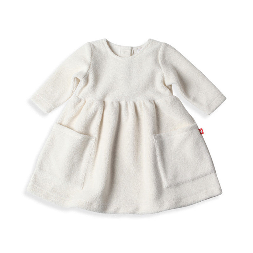 A cream-colored baby fleece dress with long sleeves, a round neckline, and knee-length skirt. It features two front pockets and appears to be solid-colored with no visible patterns.