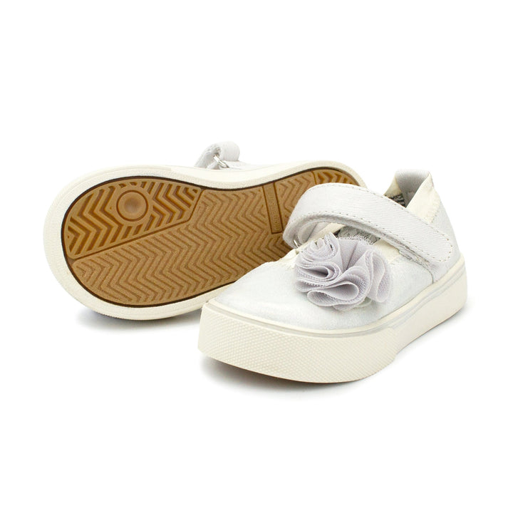 Dazzle Mary Jane features a rubber sole for a sturdy grip and a hook and loop strap closure, making it an easy choice for on-the-go adventures.