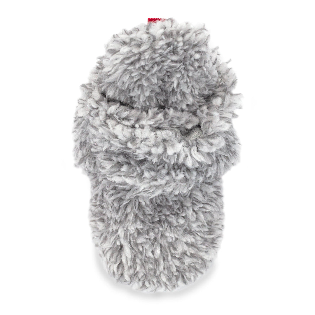 Faux fur baby booties with gripper dots on the bottom made from organic cotton.