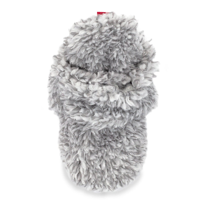 Faux fur baby booties with gripper dots on the bottom made from organic cotton.