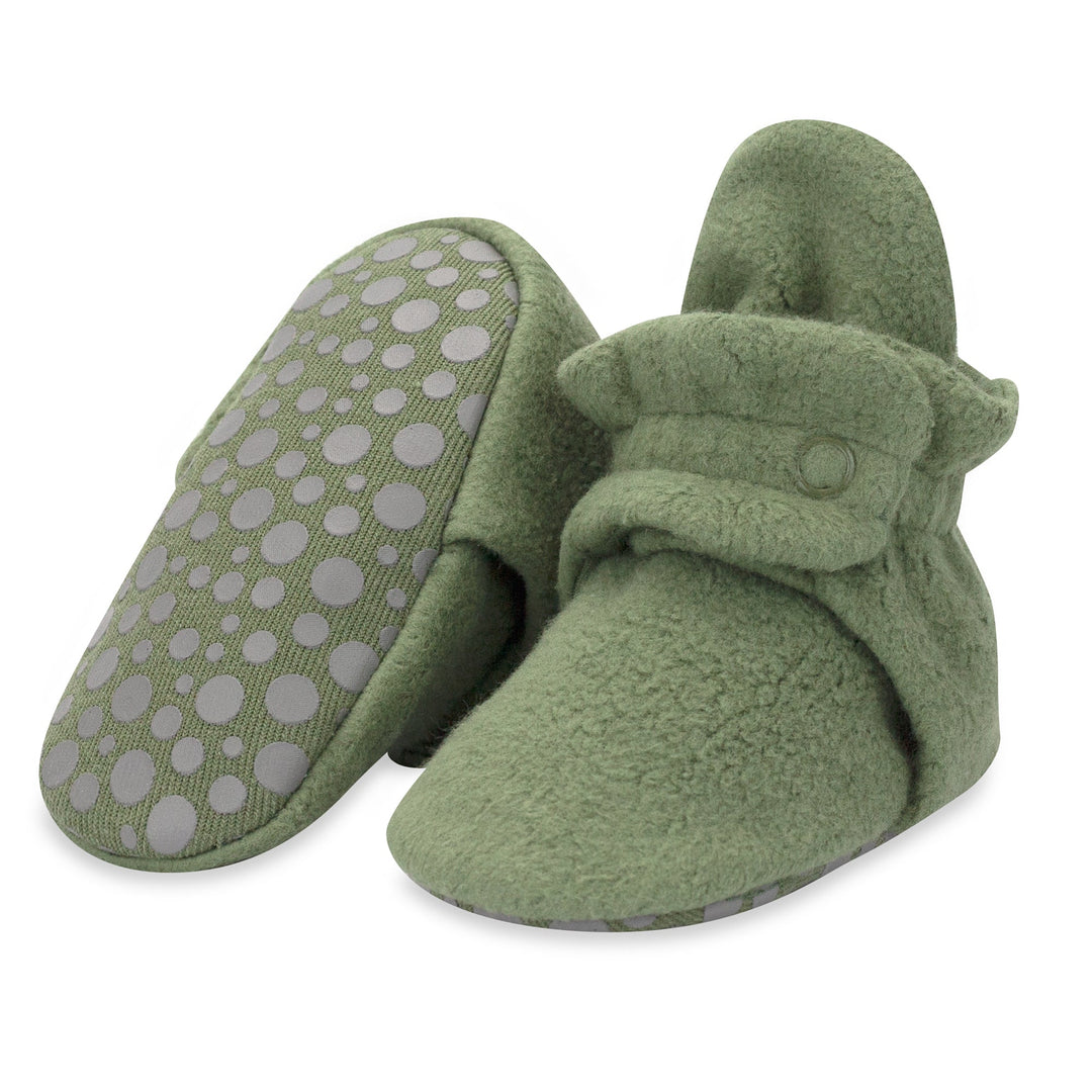 Three pairs of fleece baby booties in olive color, displayed separately against a white background.