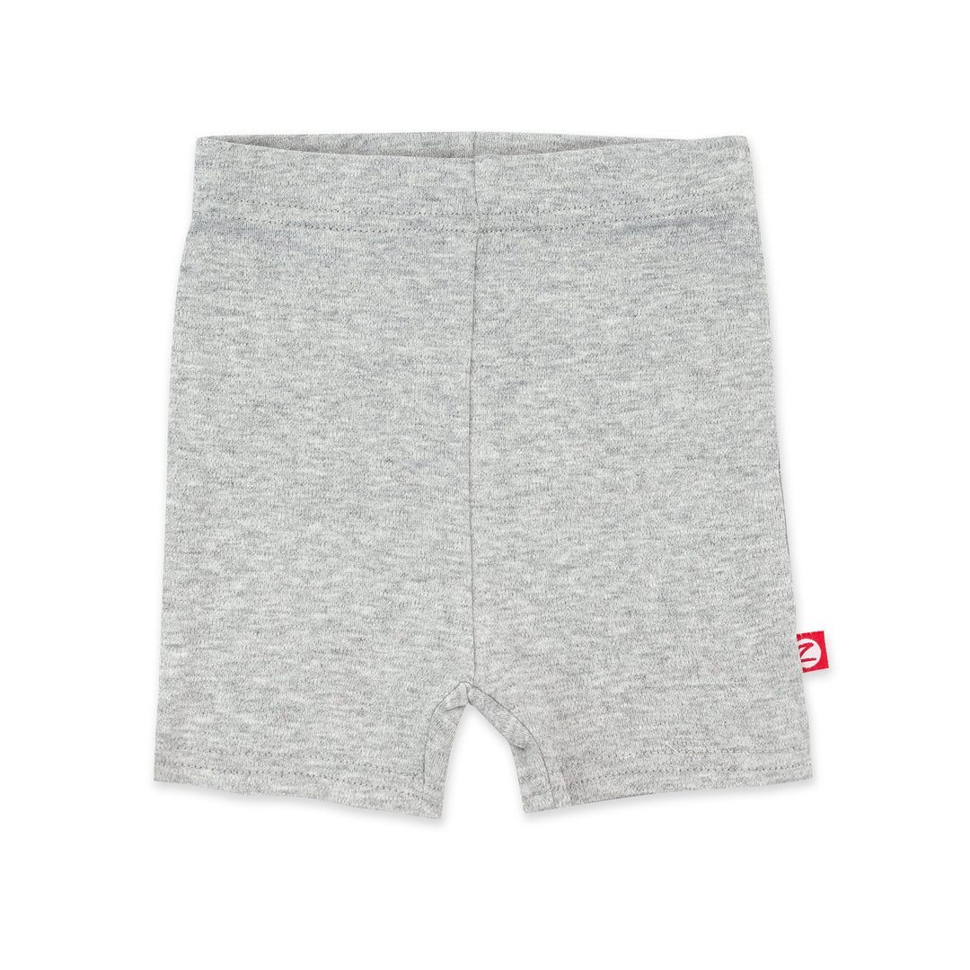 Heather gray organic cotton bike shorts for babies with a thick elastic waist band, depicted in an upright position against a white background.