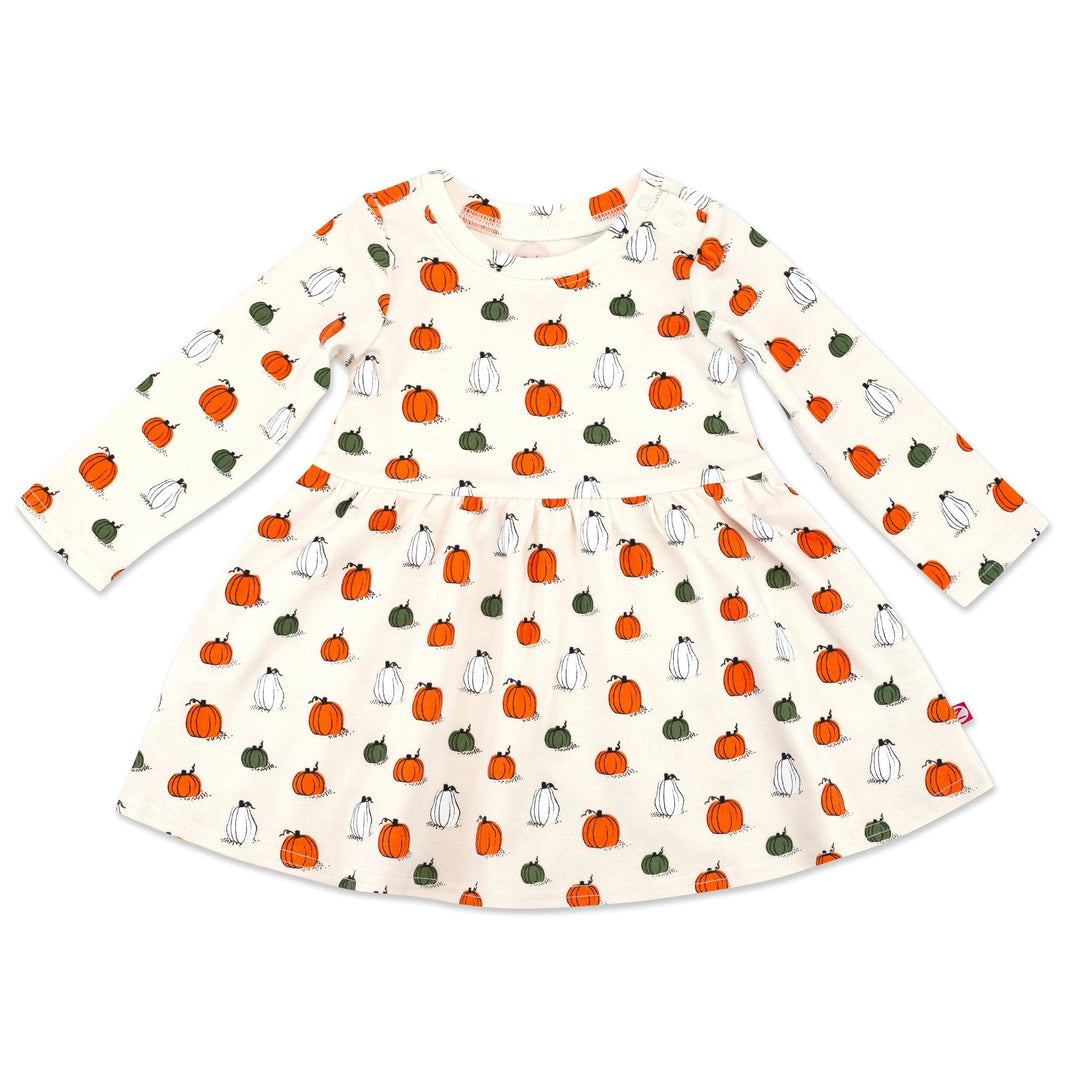 A long sleeve Forever Dress for babies, with a Pumpkin Patch print featuring pumpkins and cats on a white background, made from organic cotton.