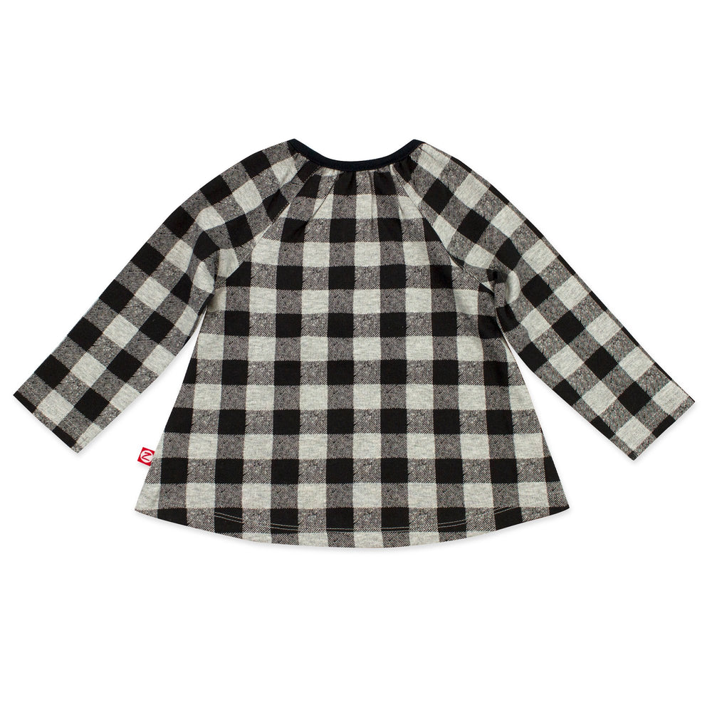 Long sleeve top that has keyhole openings at the top of each shoulder, adding style and making it easy as can be to dress baby girl.