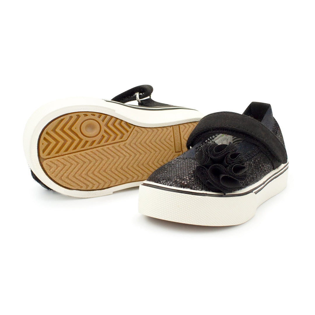 Mary Jane black shoes with a touch of added personality.