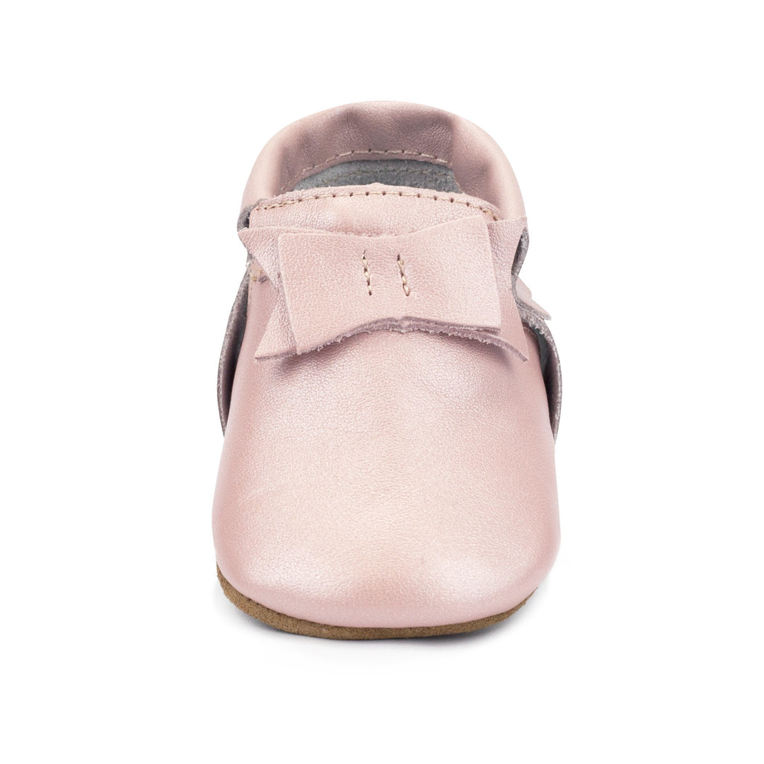 Bow Moccasins 100% genuine leather.