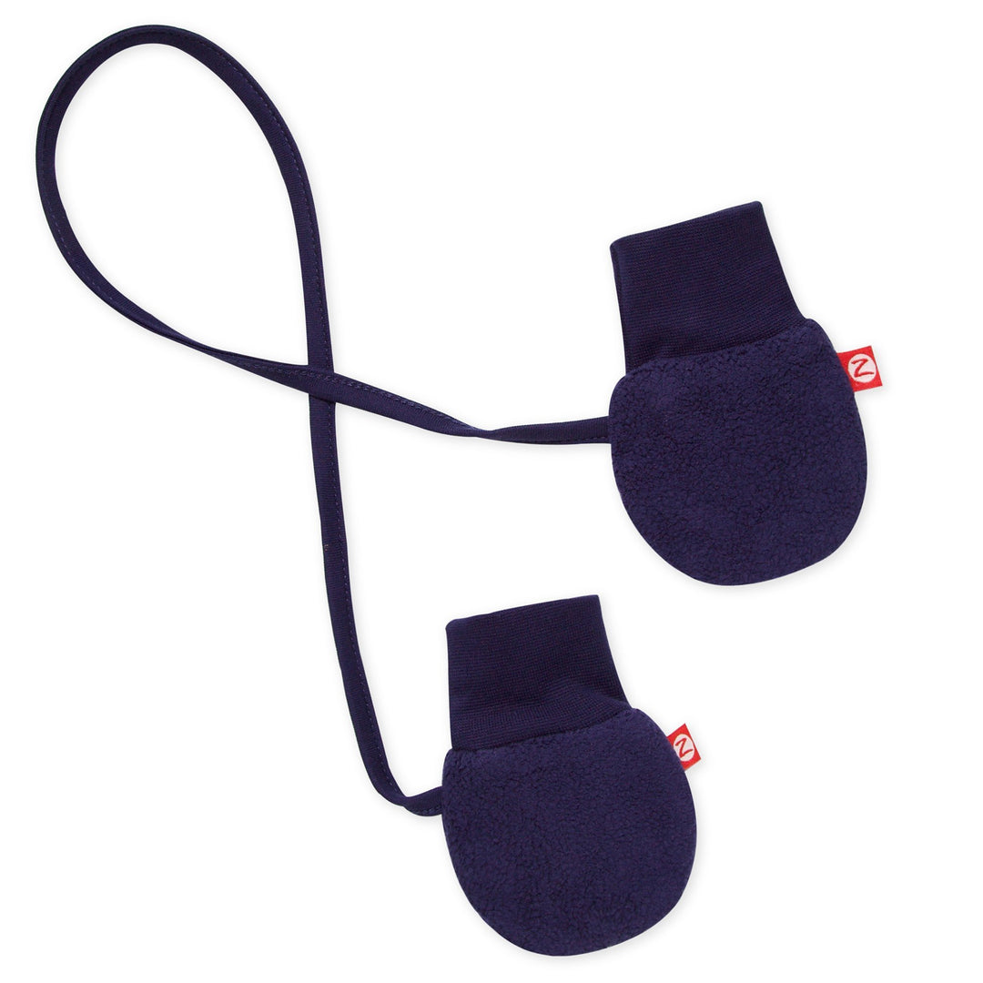 A pair of navy blue fleece mittens attached by a string, designed for infants.