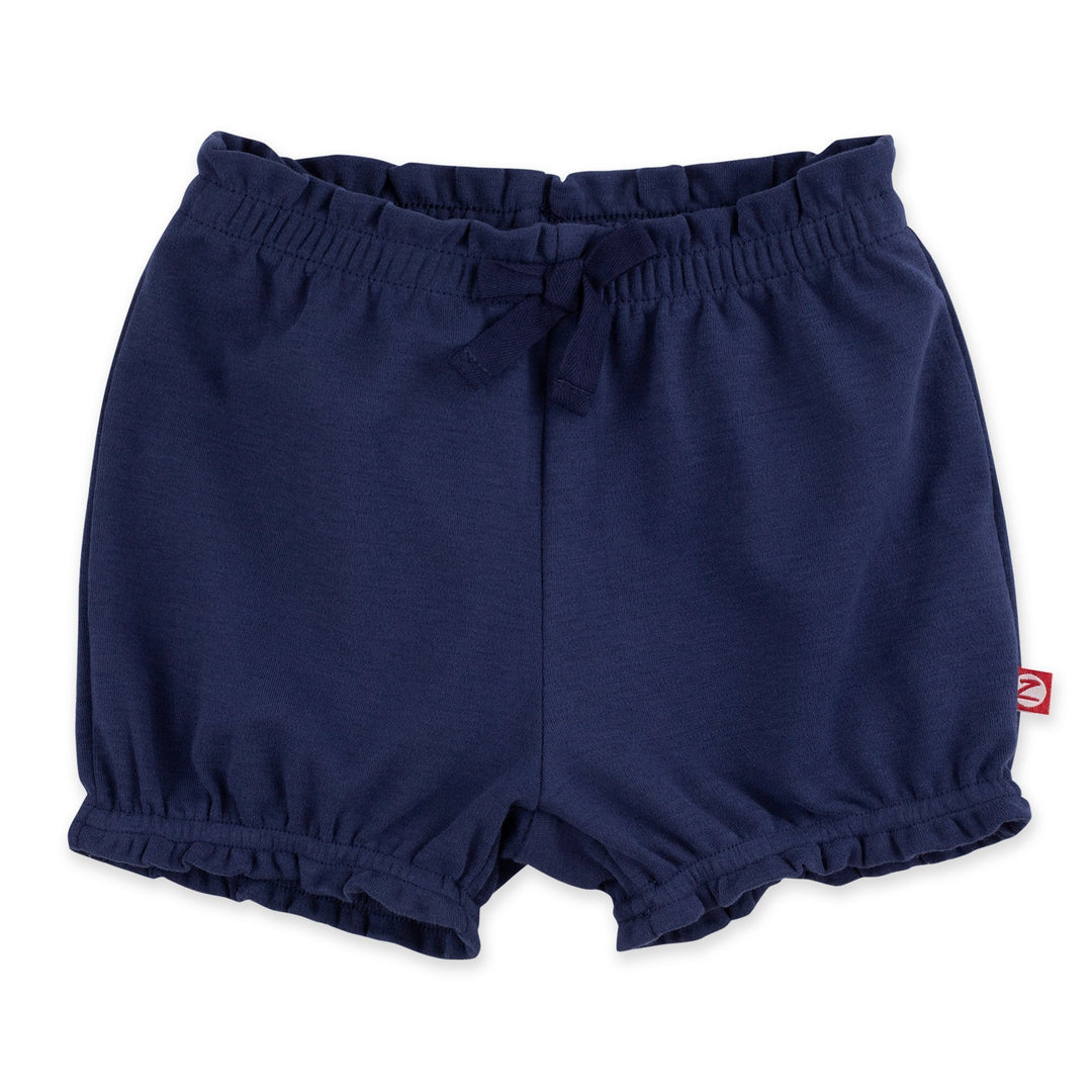 Navy blue organic cotton ruffle short for babies, with a decorative bow at the front