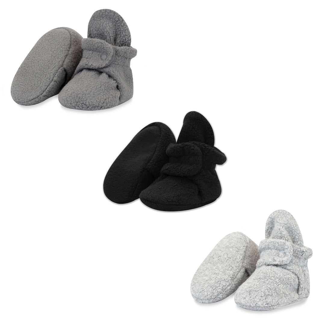 Three pairs of baby booties in gray, black, and heather gray colors, displayed separately against a white background.