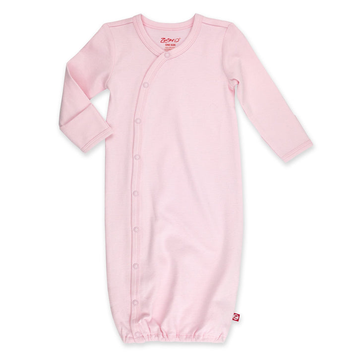 A pink organic cotton baby kimono gown with fold-over mitts on the sleeves and snaps down the front.