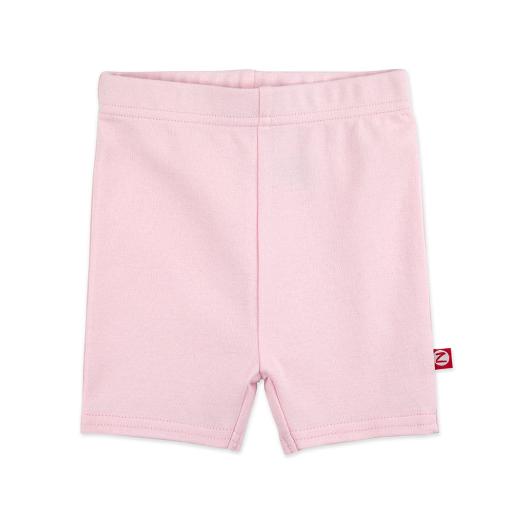 Baby pink organic cotton bike shorts for toddlers, with a thick elastic waist band.
