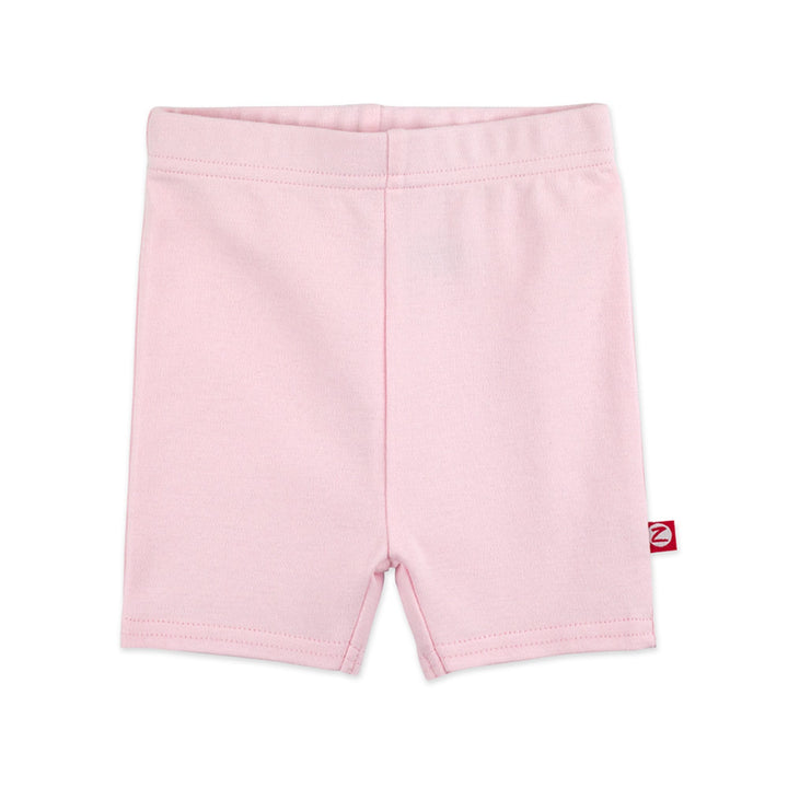 Baby pink organic cotton bike shorts for toddlers, with a thick elastic waist band.