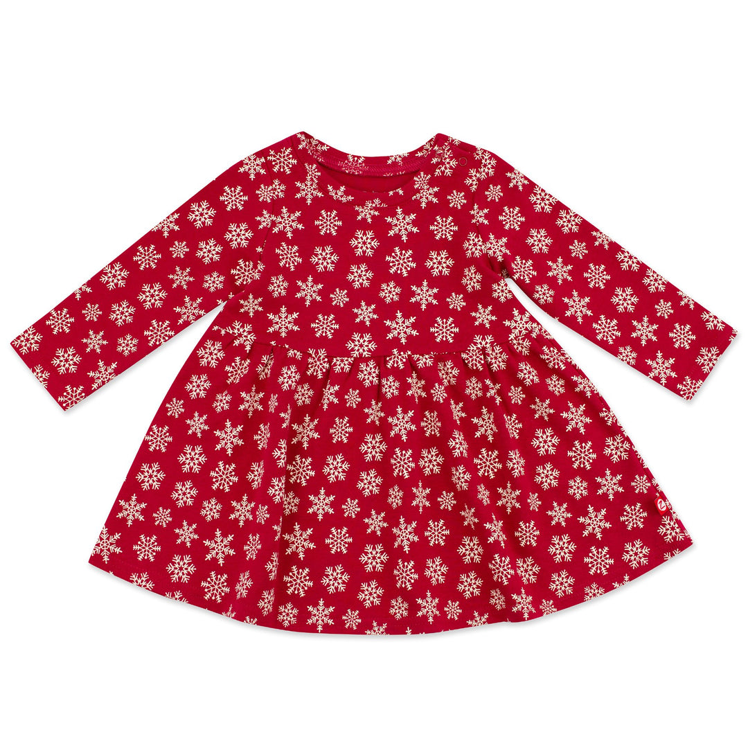 A red long sleeve dress with a snowflake print for children.