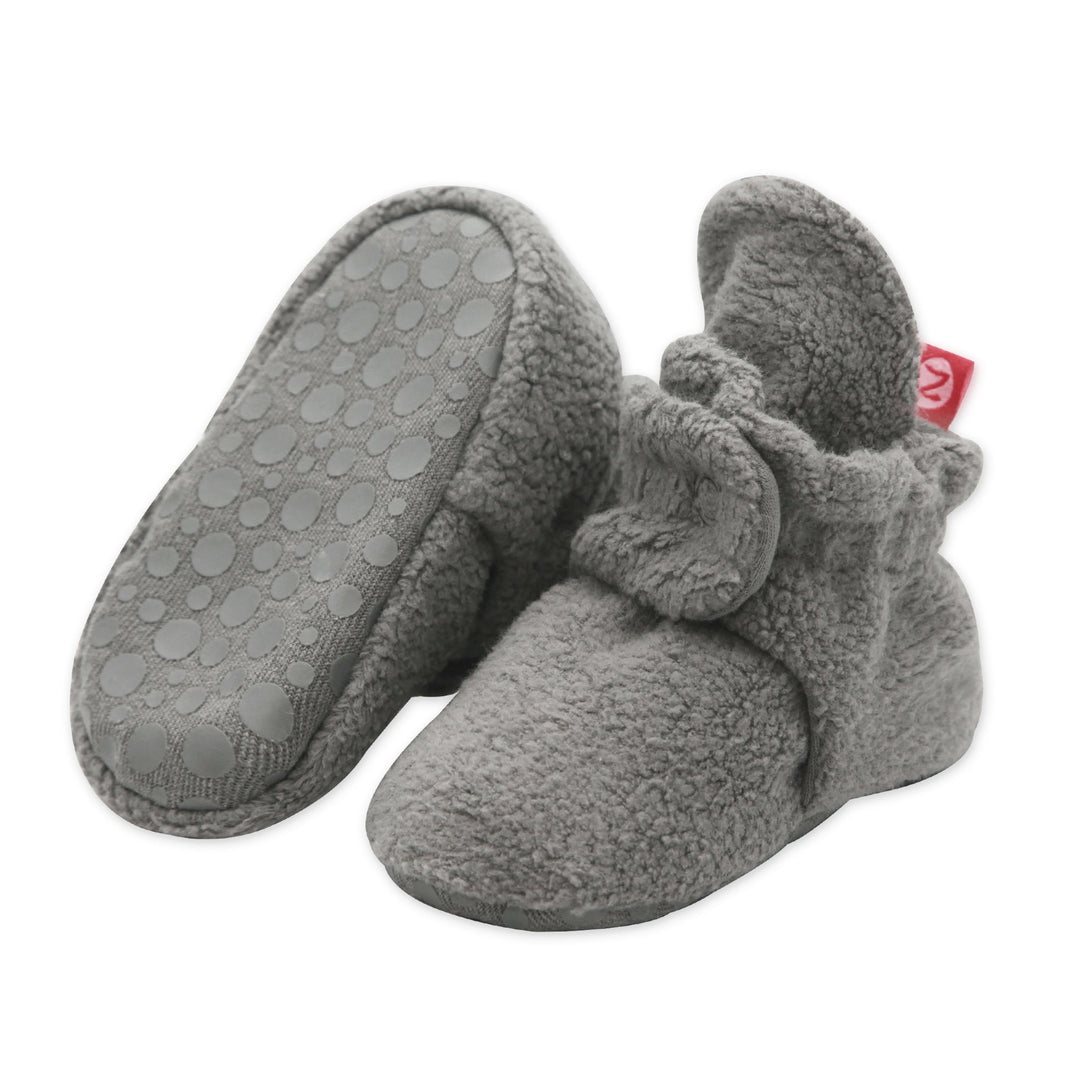Set of fleece baby booties in gray.
