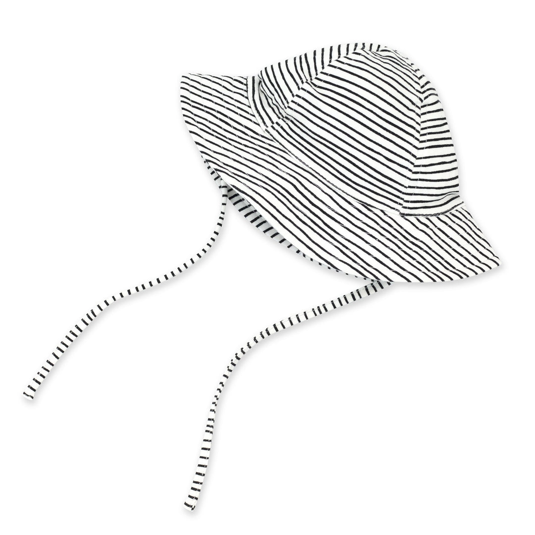 A black and white striped organic cotton sun hat with a wide brim and chin ties for babies.