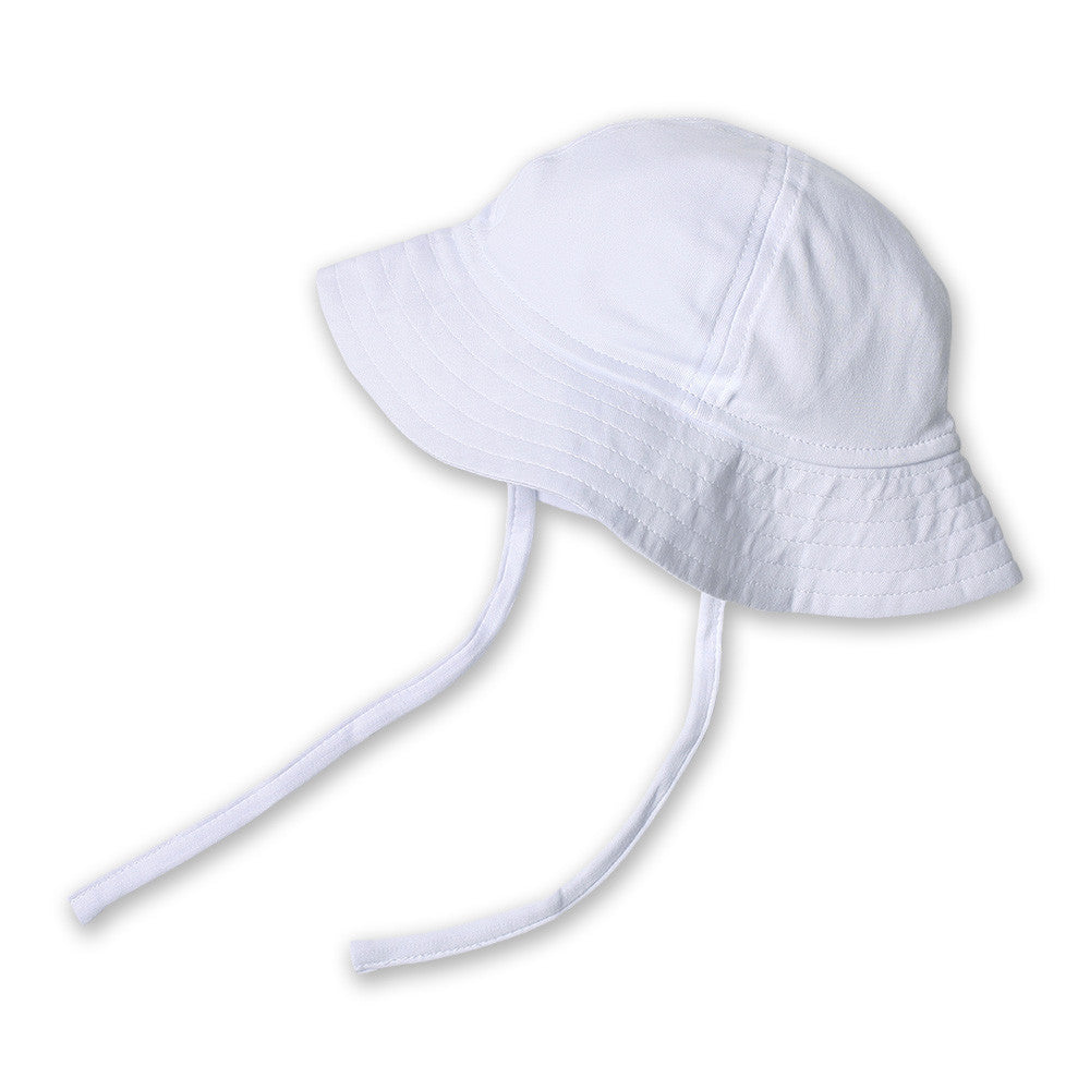 A white organic cotton sun hat with a wide brim and chin ties.