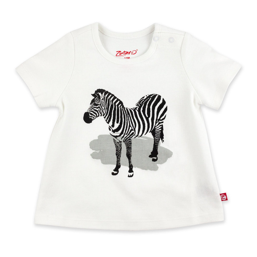 White short-sleeve swing top with a screen printed zebra on the front and a two-snap shoulder opening.
