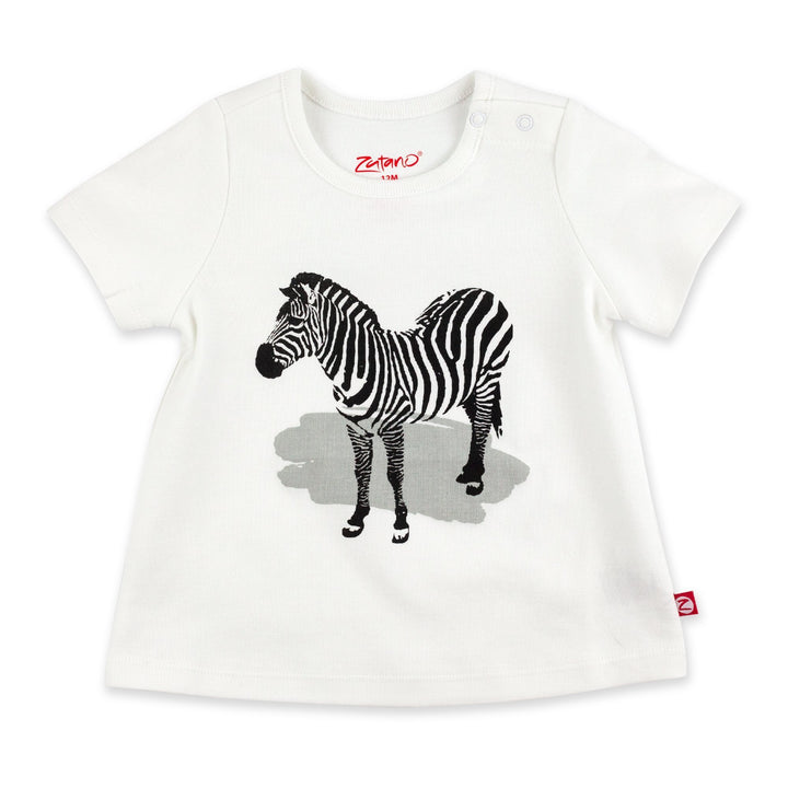 White short-sleeve swing top with a screen printed zebra on the front and a two-snap shoulder opening.