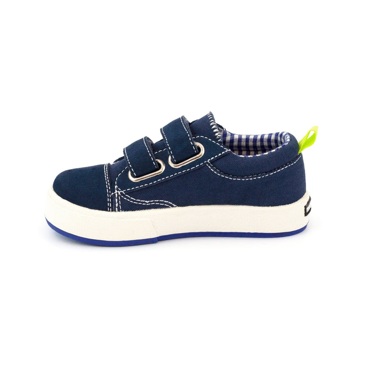 Navy children's sneakers with two-strap hook and loop closure, and a high-traction rubber outsole.